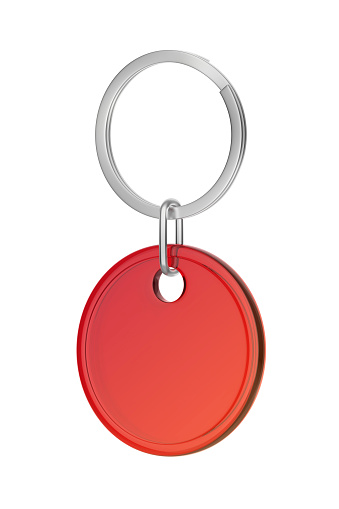 Round plastic keychain isolated on white background
