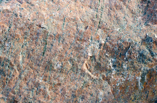 istock The texture of the stone. Rock. Granite. Stone mining. Stone surface. Mining industry. 1427952732