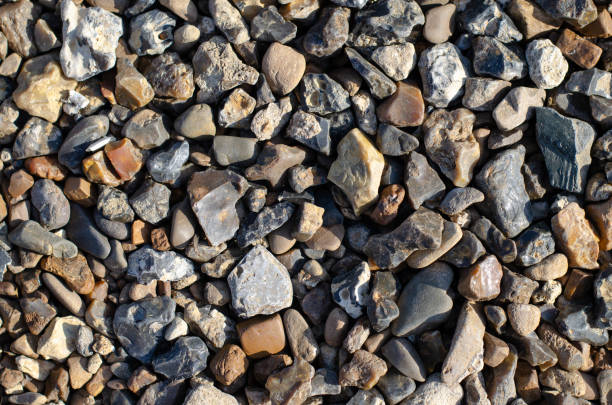 Sea pebbles lie on the shore. Rock. Decorative stones.