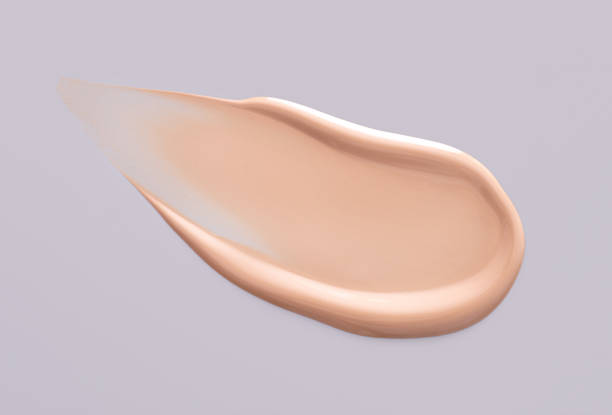 istock cosmetic smear foundation cream foundation on a grey background 1427954734