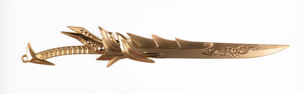 istock fantasy golden sword isolated on white background 1427955175