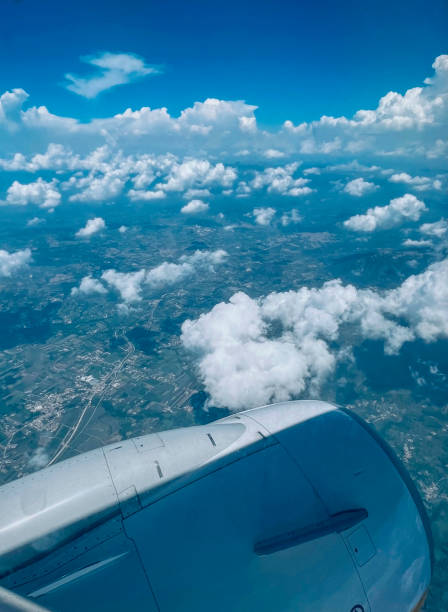istock Sky from the illuminator. Heavenly scene above the clouds. Blue sky high wing view. 1427958008