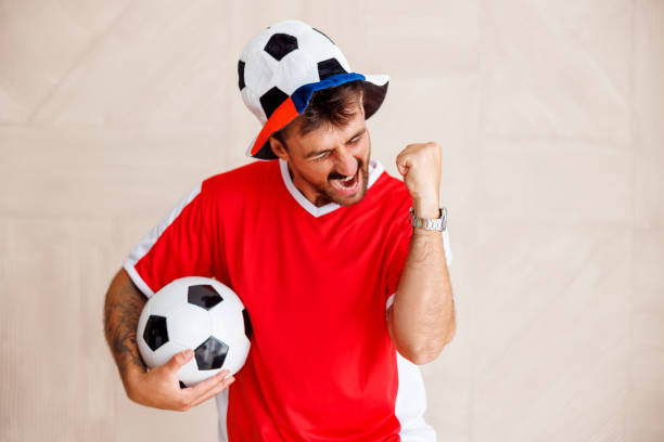 football fan celebrating his team victory - 世界冠軍 個照片及圖片檔