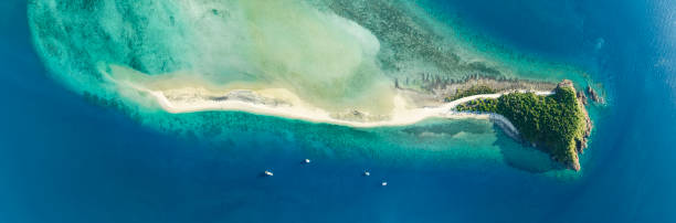 XXL high resolution panoramic high angle aerial drone view of Langford Island near Hayman Island, a luxury resort in the Whitsunday Islands group near the Great Barrier Reef, Queensland, Australia. stock photo