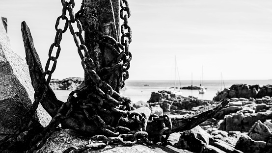 Seaside anchor, worn by rust and tides
