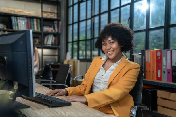 istock Employees are sitting and working in the office happily. 1427960141