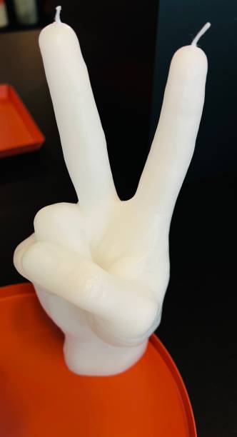 istock Victory sign candle 1427961190