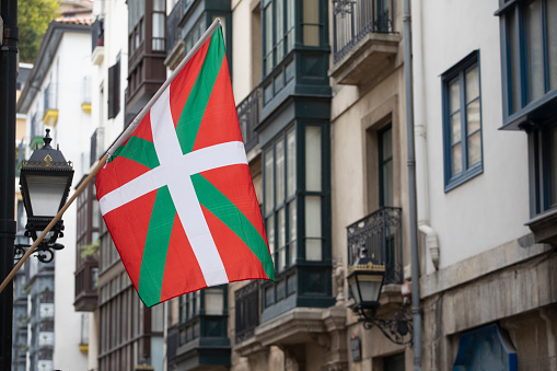 Basque flag in the old town district of Bilbao