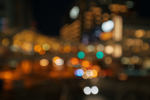 cars in the dark on the road in the city, bokeh