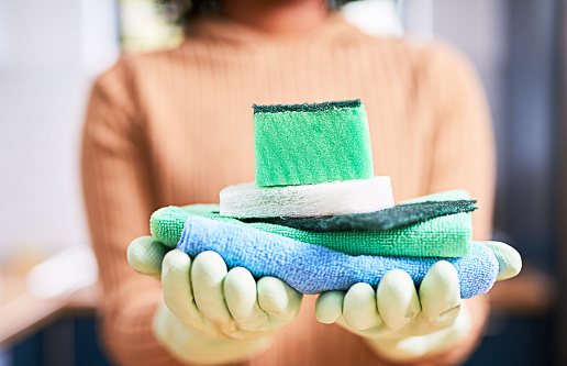 Cleaning supplies, cloth and hygiene with hands and gloves  for domestic, cleaner and housekeeping with housewife. Rag, spring cleaning and sanitary for washing, service or disinfectant with maid
