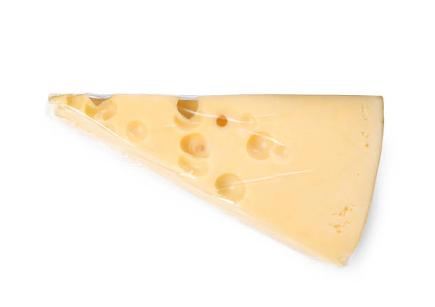 istock Cheese wrapped with transparent plastic stretch film isolated on white 1427969357