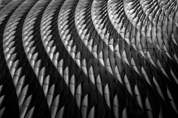 Looking up at the curved internal balcony in the middle of a residential building