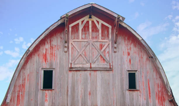 istock Old weathered Red Barn at sunrise-Howard County, Indiana 1427974665