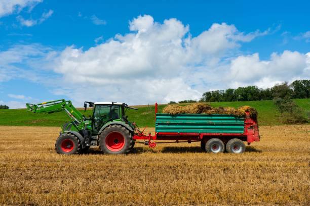 istock Combine harvester working on a field in Switzerland 1427975223