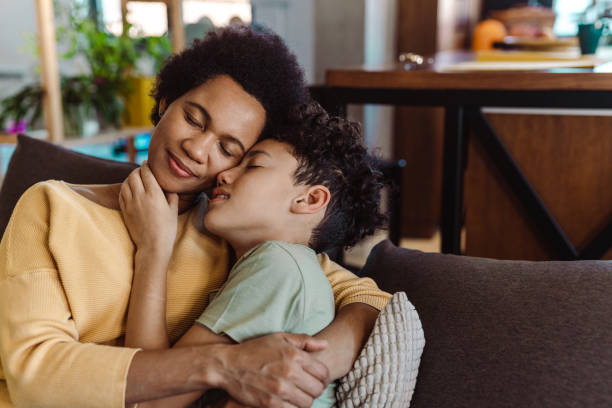 istock Caring mother spends time with her son at home 1427977284