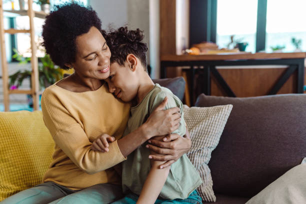 istock Caring mother spends time with her son at home 1427977289