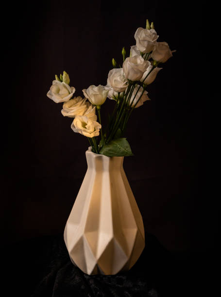 istock Bouquet of white eustoma terry in a vase 1427977330
