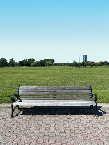 Empty bench on the lawn