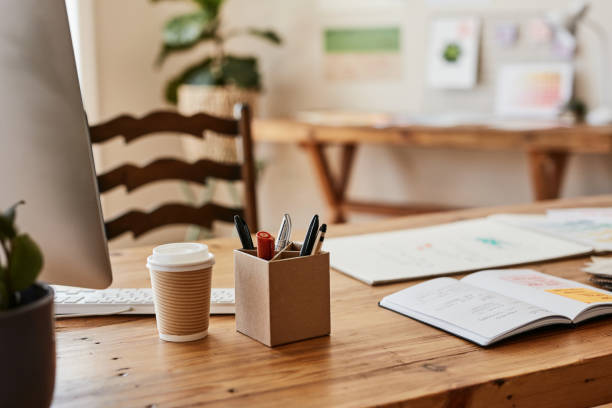 istock Interior design of empty home office for freelance business, desk with computer and notebook for creative ideas in modern remote working space. Architecture of startup company and room for workspace 1427978261