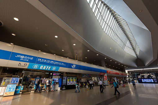 Osaka, Japan - August 14, 2022 : People at the Kansai Airport Station in Osaka, Japan. The railway station shared by Nankai Electric Railway and JR West.