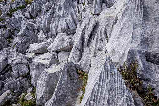 Mount Loser, Altaussee, Austria - September 6th 2022. The hiking trail on top of the Loser plateau passes some man-worked boulders, in fact, these rocks are of natural origin. This is a close-up view of these boulders.