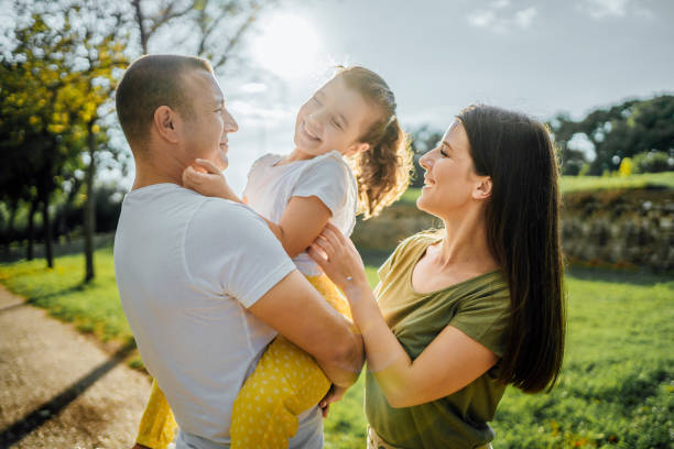 istock Happy family in the park 1427984855