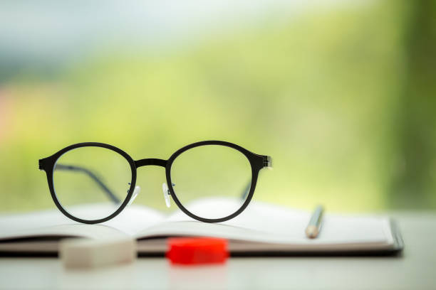 istock Object education green nature background with stack of ancient books or old bible, open paper book on wooden table with copy space. concept of back to school, research study 1427985491