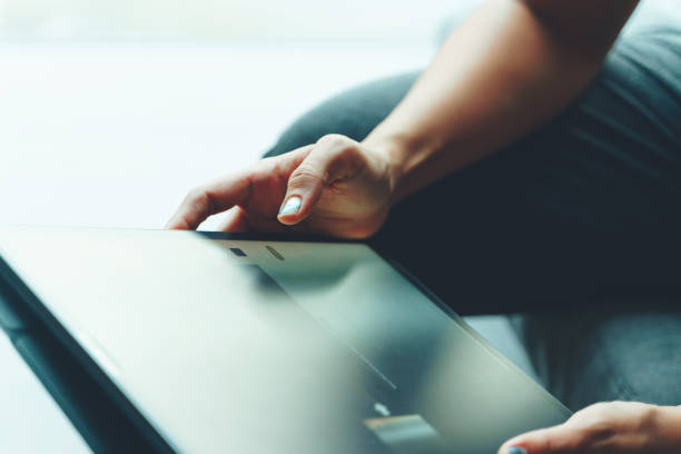 istock Indian woman browsing for shopping in the tablet 1427987028