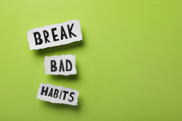 istock Phrase Break Bad Habits on green background, flat lay. Space for text 1427993508