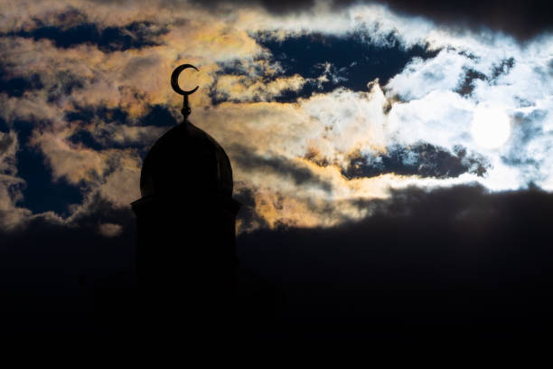 istock Silhouette of Crescent on mosque dome 1427994027