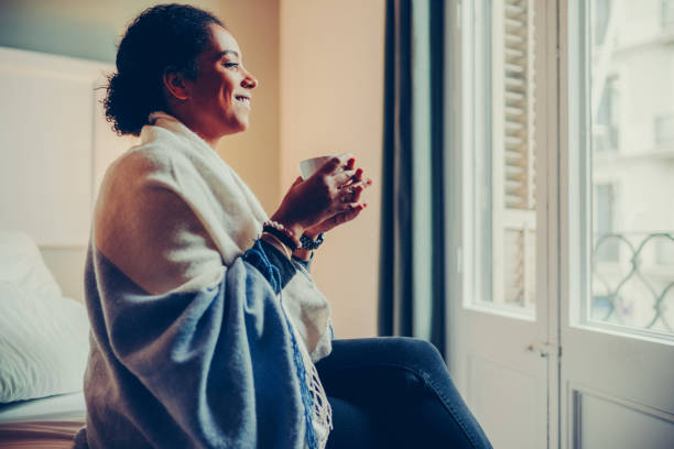 istock Woman staying home with flu virus 1428004395