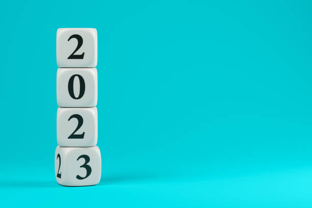 istock dice with numbers 2023 on a blue background 3D illustration 1428016577