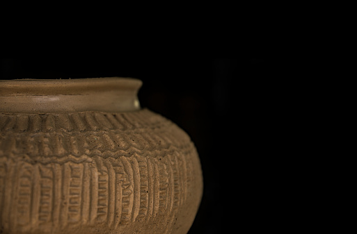 Handmade ceramic bowl on white background