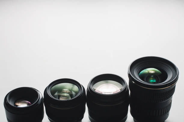istock close-up view of a group of camera lenses on a white surface 1428017592
