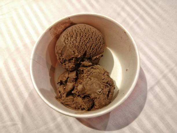istock chocolate ice cream in a white cup. 1428017791