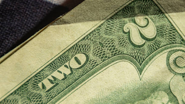 istock Macro image of American two dollar bill, foreign exchange 1428019244