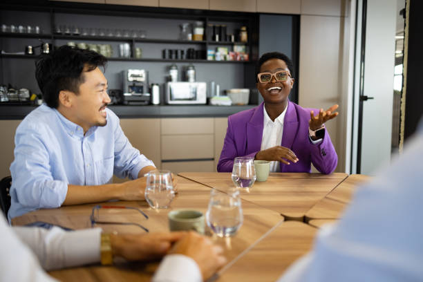 istock Diverse group of colleagues meeting in the cafeteria 1428037664