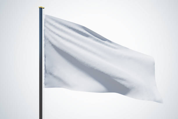 istock Blank white flag waving in the wind with copyspace for your logo or text isolated on light grey background. 3D rendering, mock up 1428038285