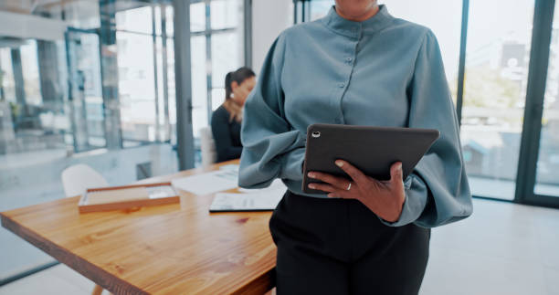 istock Business woman hands working on tablet for company software data management, digital marketing or website seo or analytics report review. Corporate worker in office with online technology innovation 1428044100