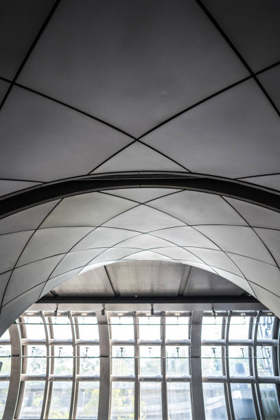 istock underside panoramic and perspective view to steel glass high rise building skyscrapers, business concept of successful industrial architecture 1428046714