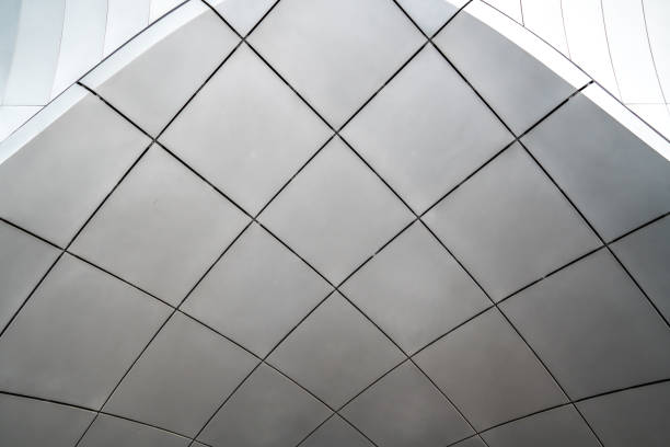 istock underside panoramic and perspective view to steel glass high rise building skyscrapers, business concept of successful industrial architecture 1428046883