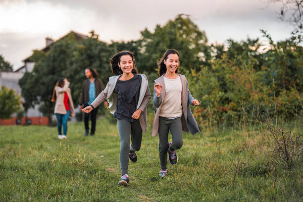 istock Happy Family Enjoying An Outdoors Walk 1428049295