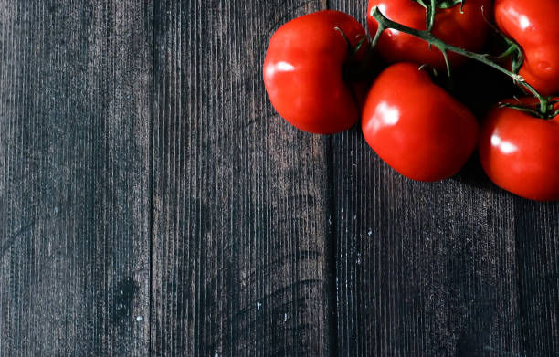 istock fresh organic cherry tomatoes on a dark background 1428053565