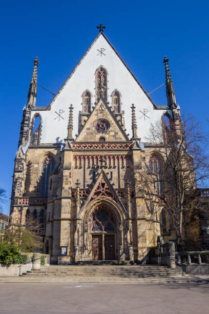 istock Front facade of the historic Thomaskirche church in Leipzig 1428053917