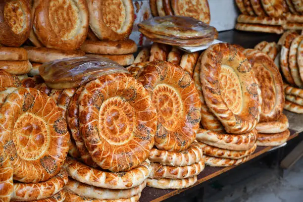 Tandyr nan, tandoor bread, sold in Kyrgyzstan. Central market in Bishkek. Osh market