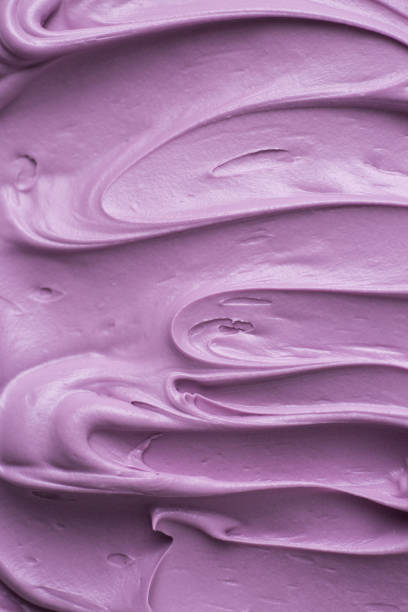istock Violet purple icing frosting close up texture 1428059476