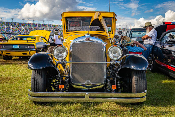 Daytona Beach, FL - November 28, 2020: Low perspective front view of a 1930 REO Flying Cloud Model 25 Touring Sedan at a local car show.
