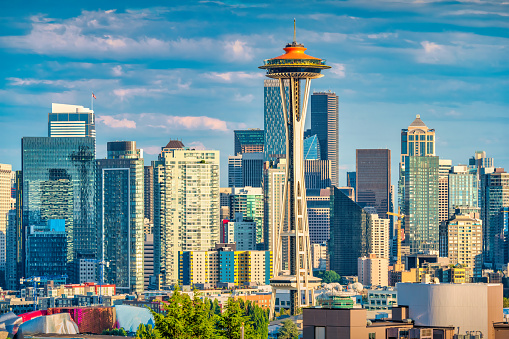 The skyline of Seattle, Washington, USA with the Space Needle observation tower on a sunny day.