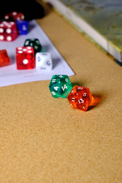 istock A role-playing book, several role-playing game dice. 1428072770