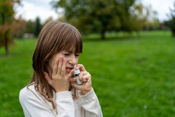 istock Young Girl is Having Sinusitis Problems Outside in Nature 1428073339